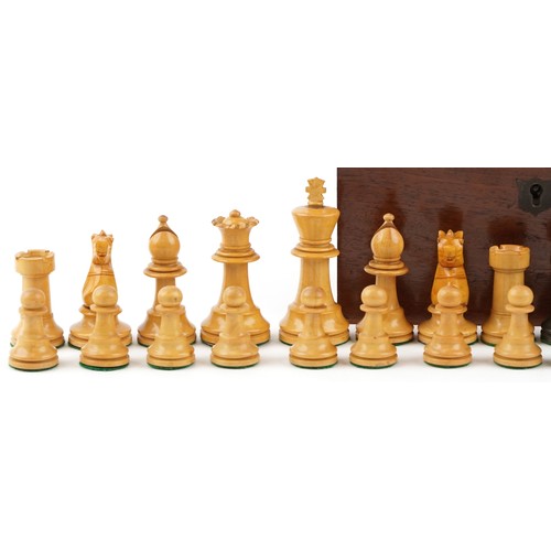 1245 - An early 20th Stauton chess set, height of King 7.5cm within a mahogany case, W-17cm.