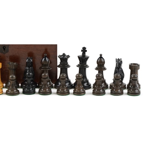 1245 - An early 20th Stauton chess set, height of King 7.5cm within a mahogany case, W-17cm.