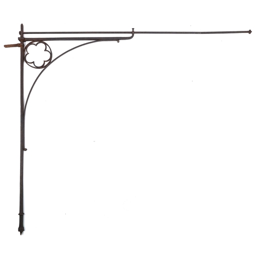 1131A - An 18th century wrought iron architectural wall bracket, 144cm high x 135cm wide.