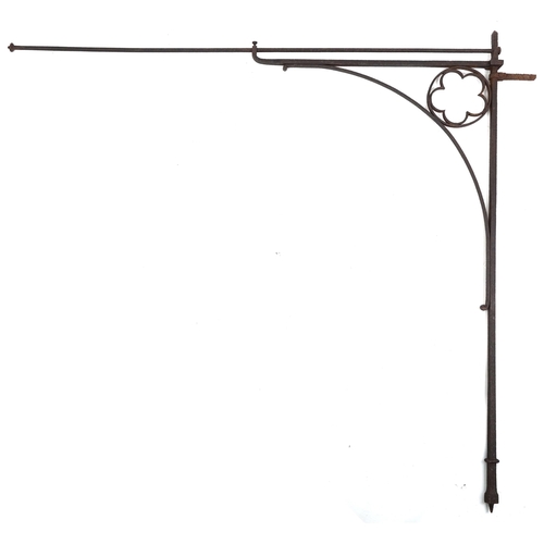 1131A - An 18th century wrought iron architectural wall bracket, 144cm high x 135cm wide.