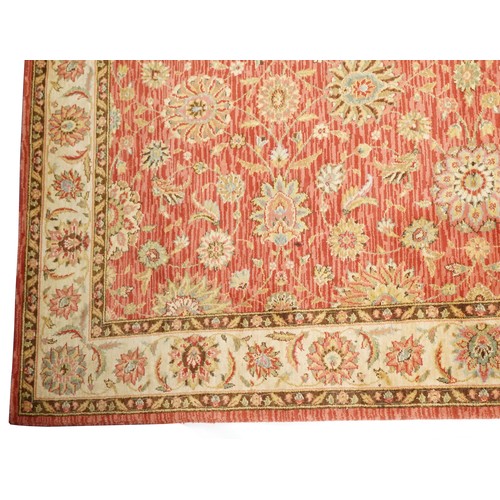 1095 - A late 20th century machine made carpet decorated with floral sprays, 252cm x 167cm, together with a... 