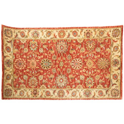 1095 - A late 20th century machine made carpet decorated with floral sprays, 252cm x 167cm, together with a... 