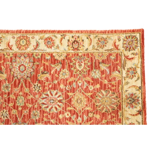 1095 - A late 20th century machine made carpet decorated with floral sprays, 252cm x 167cm, together with a... 