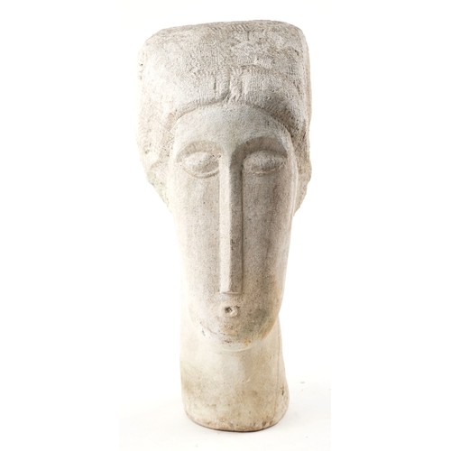 350 - A 20th century carved cast composition abstract bust of elongated form, 53cm high.