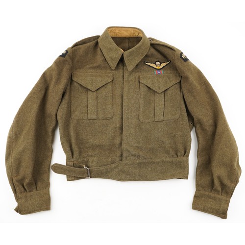 2535 - Canadian military interest paratroopers battle dress jacket with cloth patches.