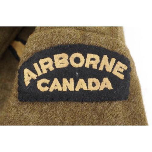 2535 - Canadian military interest paratroopers battle dress jacket with cloth patches.