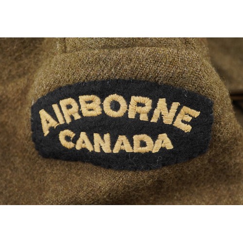 2535 - Canadian military interest paratroopers battle dress jacket with cloth patches.