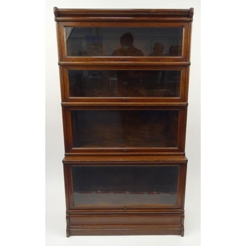 1138 - An early 20th century oak four section Globe Wernicke style library bookcase, H-150cm