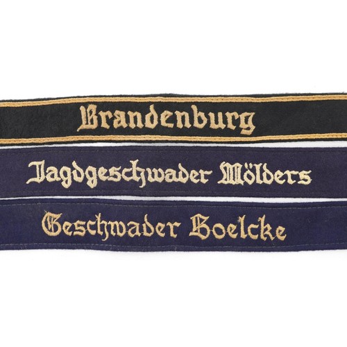 2583 - Three German military interest armbands.