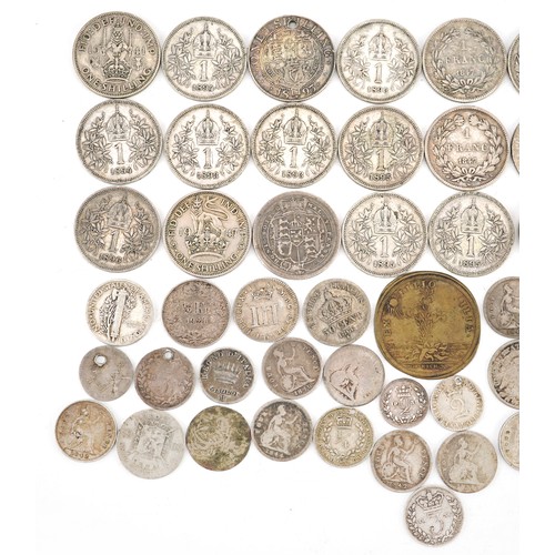 2148 - A collection of 18th century and later British and world coinage, mostly silver including Maundy coi... 