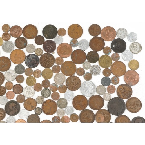 2189 - A quantity of 19th century and later British and world coinage including silver examples.