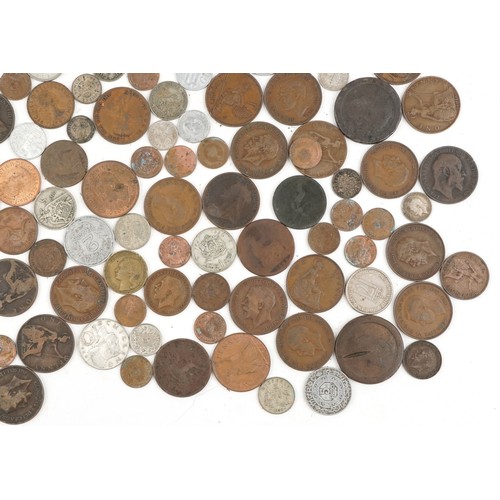 2189 - A quantity of 19th century and later British and world coinage including silver examples.