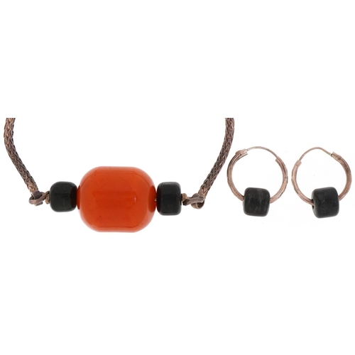 3315A - Unmarked silver amber coloured bead and Mayan jade necklace and a pair of similar earrings, the ambe... 