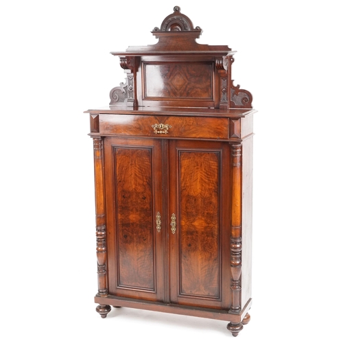 A Victorian walnut narrow chiffoniere, the shelf back above a drawer and a pair of panel doors, 193cm H x 98cm W x 32cm D.