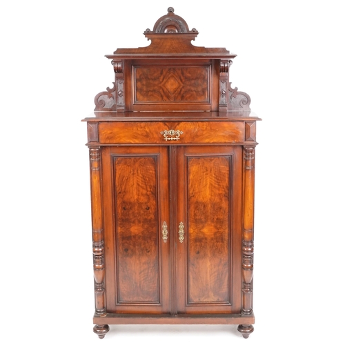 1006 - A Victorian walnut narrow chiffoniere, the shelf back above a drawer and a pair of panel doors, 193c... 