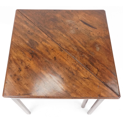 1004 - A late George III mahogany drop flap tea table raised on moulded legs, 71cm H x 100cm W x 100cm D.