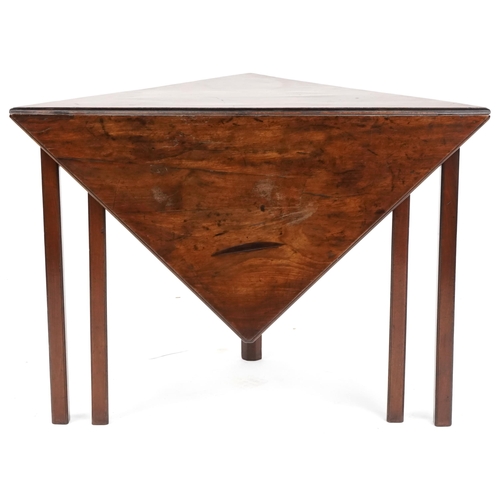 1004 - A late George III mahogany drop flap tea table raised on moulded legs, 71cm H x 100cm W x 100cm D.