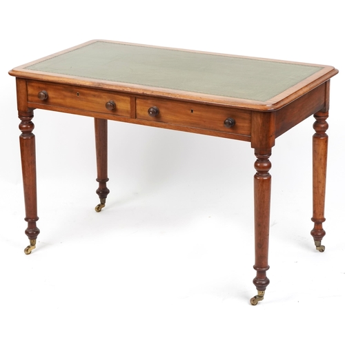 1005 - A late Victorian mahogany writing table, the top inset with a green gilt tooled leather writing surf... 