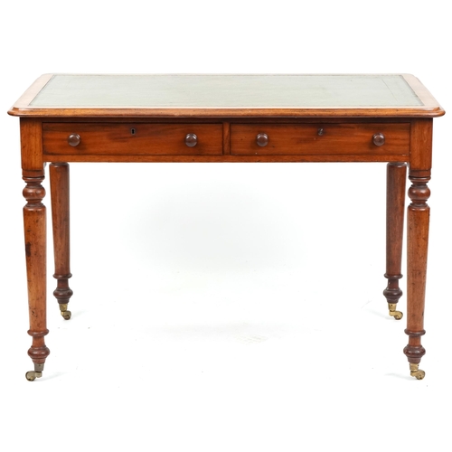 1005 - A late Victorian mahogany writing table, the top inset with a green gilt tooled leather writing surf... 