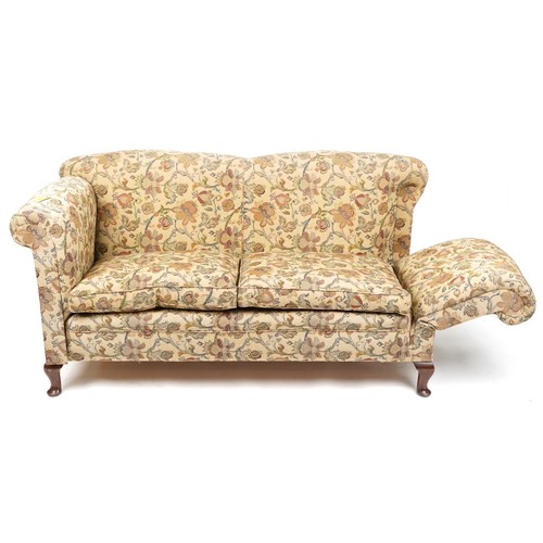  A late Victorian drop end two seat settee upholstered in floral damask, raised on cabriole legs, 88c... 