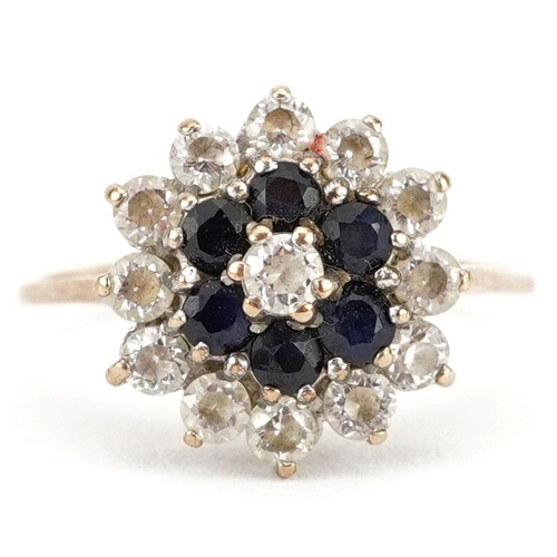 309 - A 9ct gold blue spinel and clear stone three tier cluster ring, size L, 2.2g.