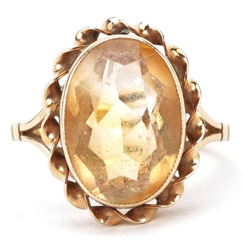 440 - A 9ct gold citrine solitaire ring, the citrine approximately 13.50mm x 10.10mm x 6.50mm deep, size N... 