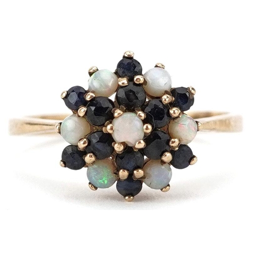 432 - A 9ct gold opal and sapphire three tier cluster ring, size R, 2.6g.