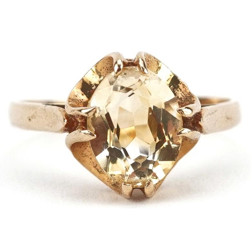 477 - A 9ct gold citrine solitaire ring, size N, 2.3g.