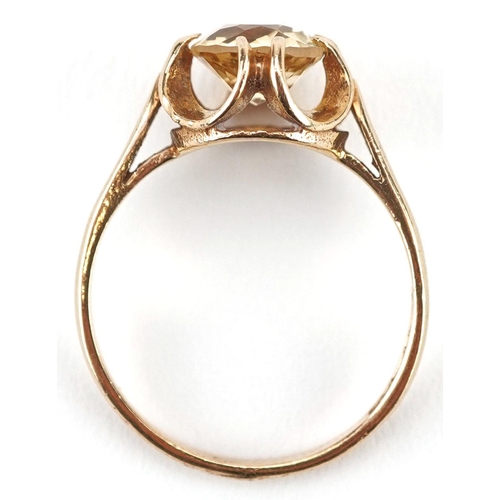 477 - A 9ct gold citrine solitaire ring, size N, 2.3g.