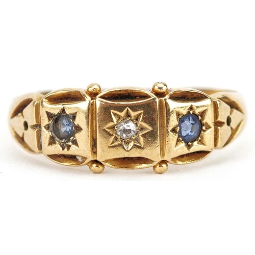 An antique 18ct gold diamond and sapphire three stone ring with ornate setting, indistinct hallmarks, size Q, 2.7g.