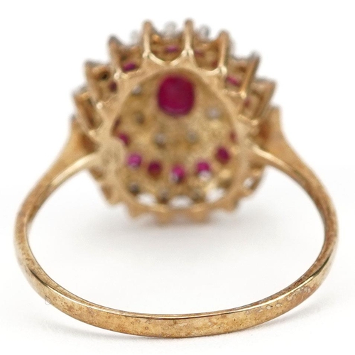  A 9ct gold ruby and diamond four tier cluster ring, size P, 2.5g.