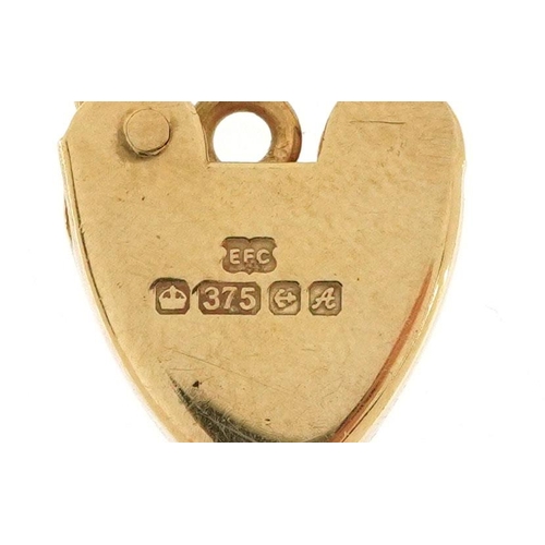 374 - A 9ct gold love heart padlock clasp, 2cm high, 1.8g.