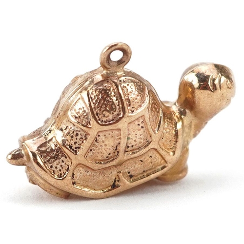 181 - A 9ct gold charm in the form of a tortoise, 2.2cm in length, 1.4g.