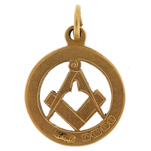 337 - An 18ct gold masonic charm, 2cm high, 2.9g.