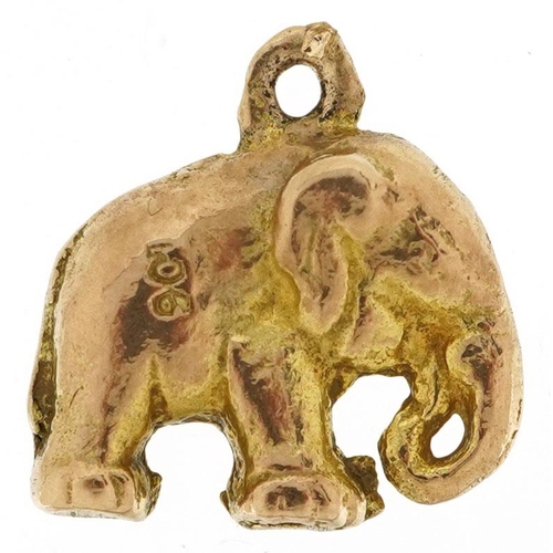 201 - A 9ct gold charm in the form of an elephant, 1.6cm high, 4.9g.