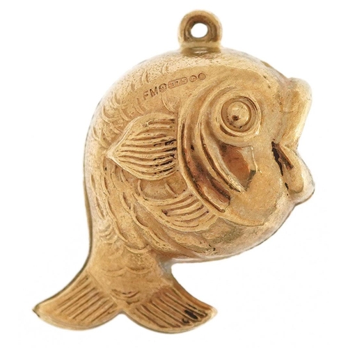 424 - A 9ct gold charm in the form of a fish, 2.5cm high, 1.8g.