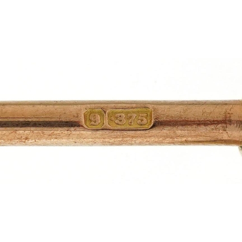 207 - A 9ct rose gold T bar, 3.9cm wide, 4.4g.