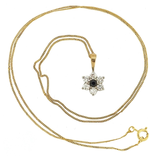 373 - A 9ct gold sapphire and clear stone flower head pendant on a 9ct gold necklace, 1.3cm high and 40cm ... 