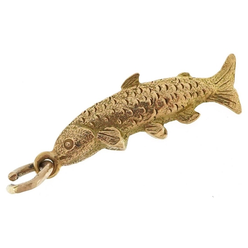 572 - A 9ct gold charm in the form of a trout, 2.3cm in length, 1.7g.