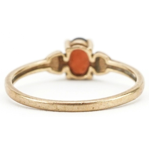 222 - A 9ct gold garnet solitaire ring, size L, 1.2g.