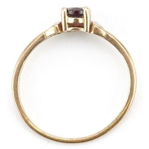 222 - A 9ct gold garnet solitaire ring, size L, 1.2g.