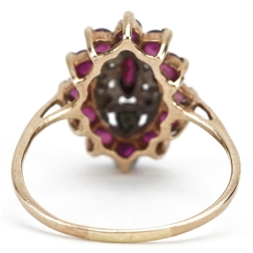 235 - A 9ct gold ruby and diamond three tier cluster ring, size L/M, 1.9g.