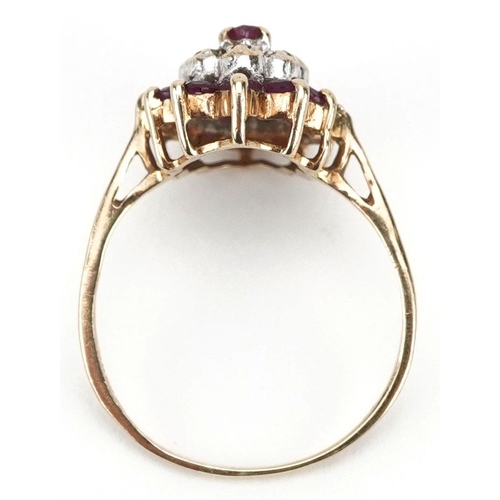 235 - A 9ct gold ruby and diamond three tier cluster ring, size L/M, 1.9g.