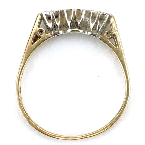 140 - A 9ct gold diamond three stone ring, size Q, 2.9g.