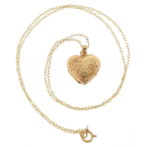 232 - A 9ct gold floral engraved love heart locket on a 9ct gold necklace, 1.8cm high and 44cm in length, ... 