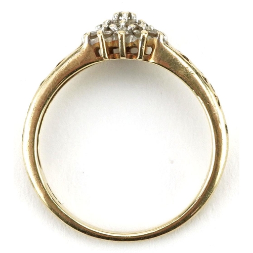 136 - A 9ct gold diamond three tier flower head ring with pierced shoulders, size N, 2.1g.