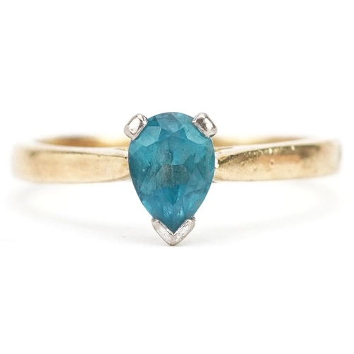 293 - An 18ct gold blue topaz tear drop ring, size P/Q, 3.6g.