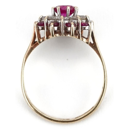 226 - A 9ct gold pink topaz and clear stone three tier flower head ring, size P, 2.7g.