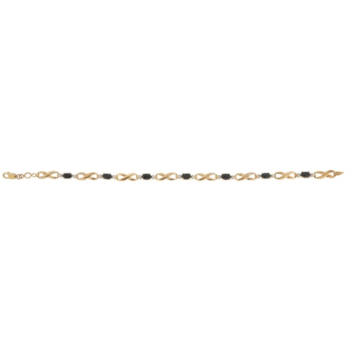  A 9ct gold sapphire and diamond infinity link bracelet, 18cm in length, 5.2g.