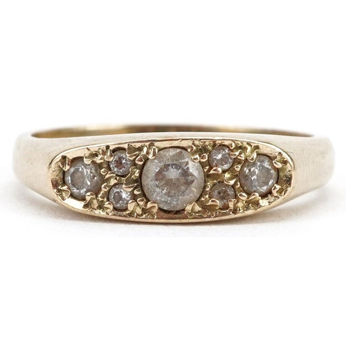 339 - An unmarked gold clear stone cluster ring, size Q, 2.9g.